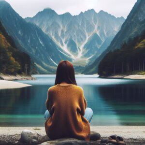 Ways Achieve Inner Peace: Connecting with nature by sitting by a serene lake to rejuvenate the spirit.